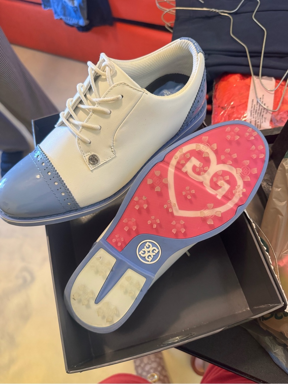 G/FORE White and Light Blue Lace-Up Golf Sneaker with Pink Sole Accent
